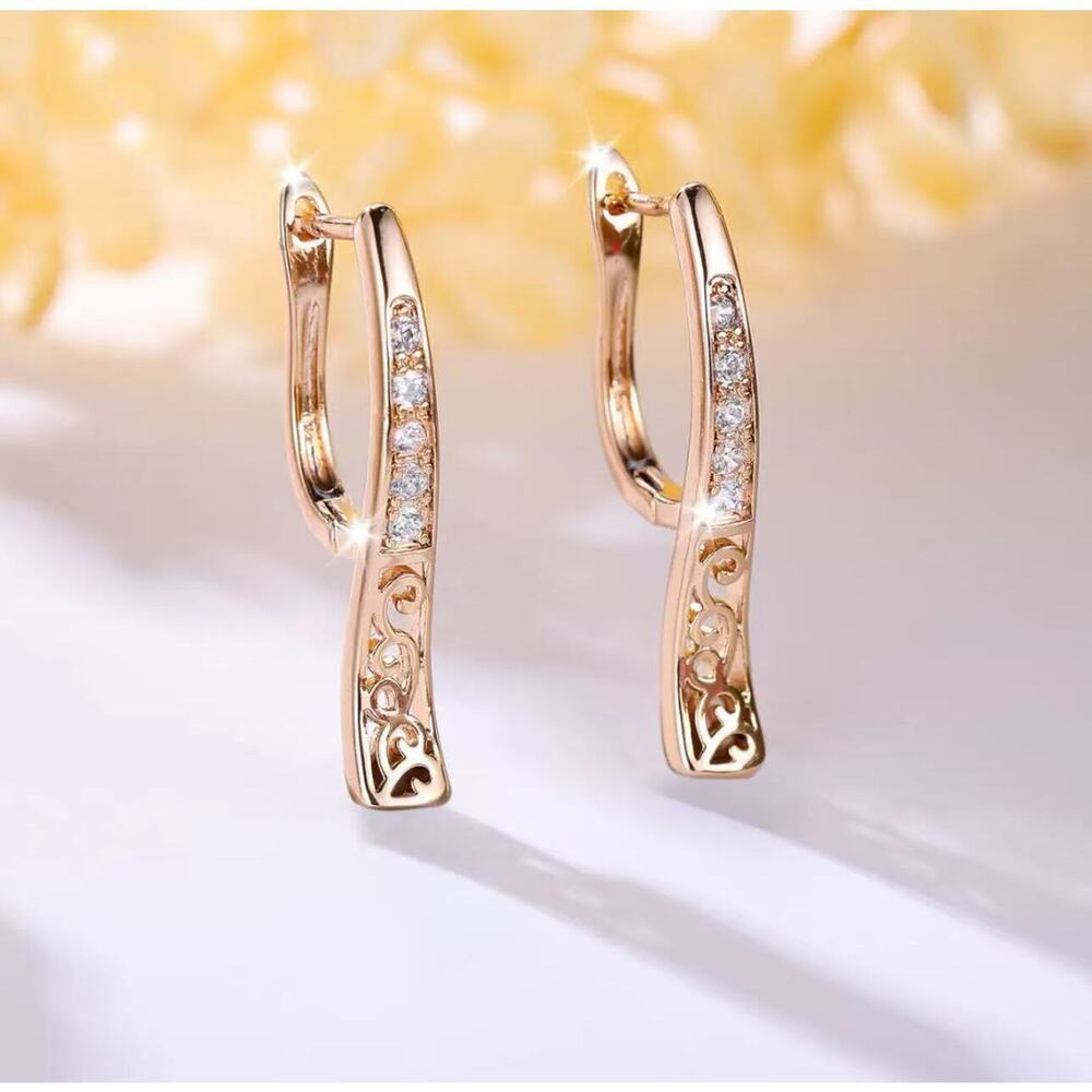 U-channel drop earrings with a sleek hollowed channel.